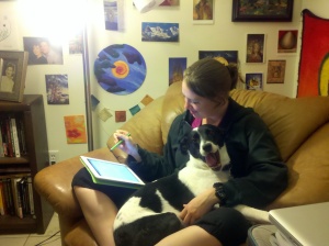 Sam with iPad and dog